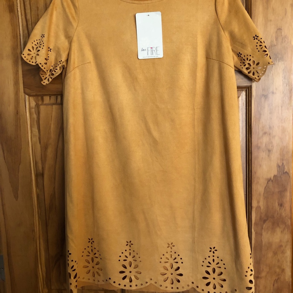 Suede dress with cut out features